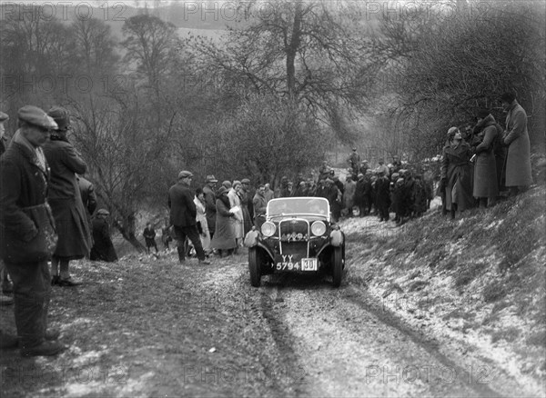 Singer of W Writer competing at the Sunbac Colmore Trial, Gloucestershire, 1933. Artist: Bill Brunell.