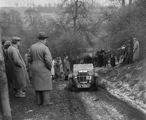 Cycle-winged MG J2 of JR Temple competing at the Sunbac Colmore Trial, Gloucestershire, 1933. Artist: Bill Brunell.