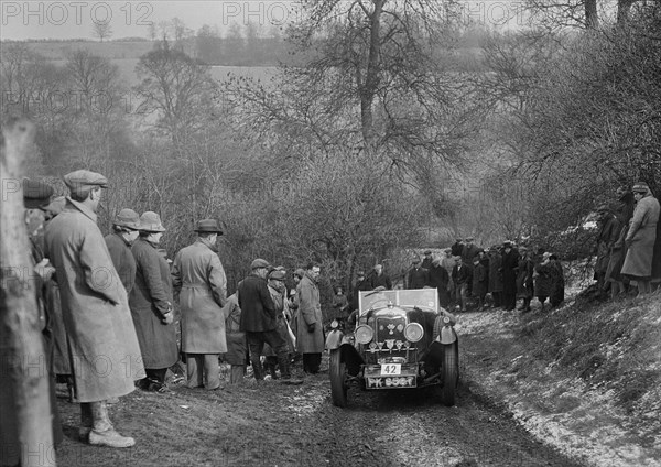 Riley open 4-seater tourer of HC Hunter, North West London Motor Club London-Gloucester Trial, 1932. Artist: Bill Brunell.