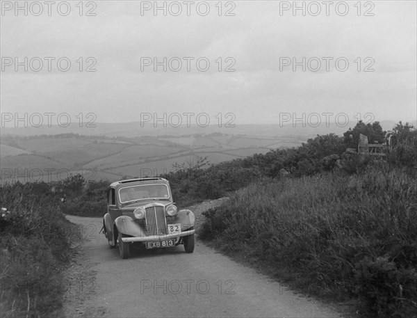 Talbot 10 of LF Phillipson competing in the MCC Torquay Rally, 1938. Artist: Bill Brunell.