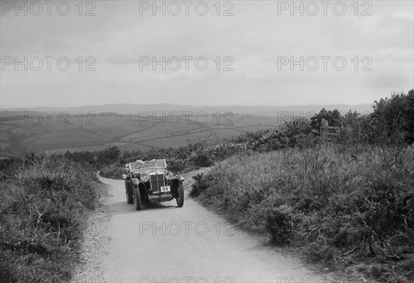 MG Magna of EG Burt competing in the MCC Torquay Rally, 1938. Artist: Bill Brunell.