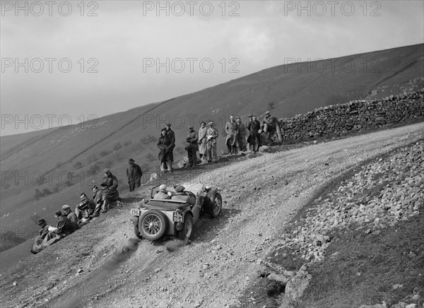 MG TA of JES Jones competing in the MCC Edinburgh Trial, 1937. Artist: Bill Brunell.