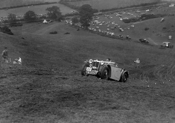 MG PA of the Cream Cracker team competing in the MG Car Club Rushmere Hillclimb, Shropshire, 1935. Artist: Bill Brunell.