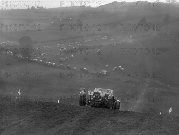 Aston Martin competing in the MG Car Club Rushmere Hillclimb, Shropshire, 1935. Artist: Bill Brunell.