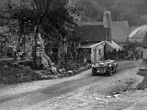 Lagonda of Lord de Clifford competing in the MCC Sporting Trial, Litton Slack, Derbyshire, 1930. Artist: Bill Brunell.