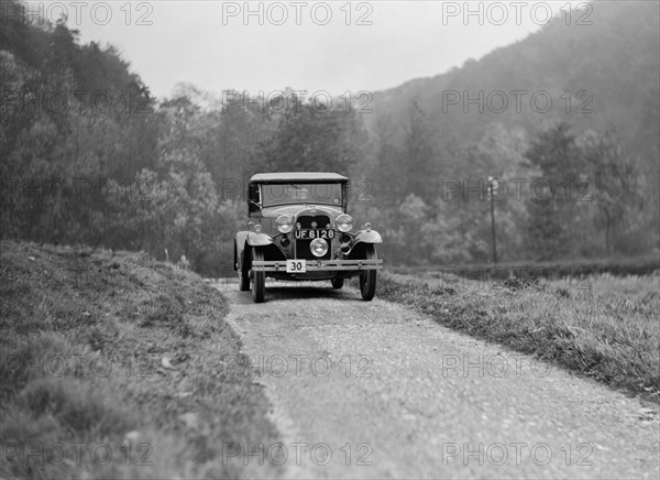 Ford Model A of EAL Midgely competing in the MCC Sporting Trial, 1930. Artist: Bill Brunell.