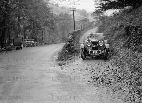 Lagonda of JS Hathaway competing in the MCC Sporting Trial, 1930. Artist: Bill Brunell.