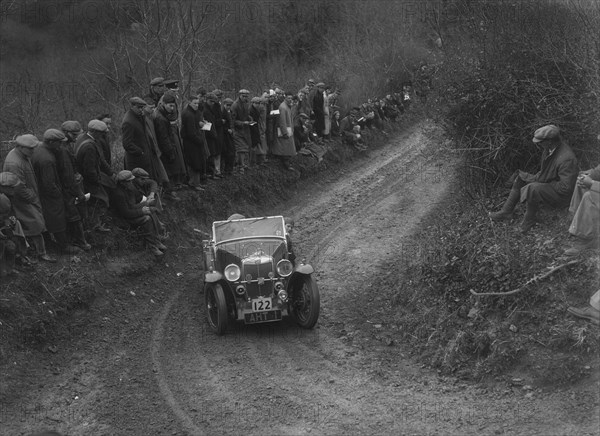 MG PB of EH Goodenough competing in the MCC Lands End Trial, 1935. Artist: Bill Brunell.