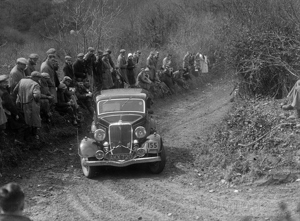 Ford V8 of Major DEM Douglas-Morris competing in the MCC Lands End Trial, 1935. Artist: Bill Brunell.