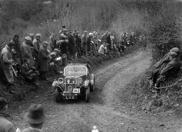 Singer Le Mans of HM Hutton competing in the MCC Lands End Trial, 1935. Artist: Bill Brunell.