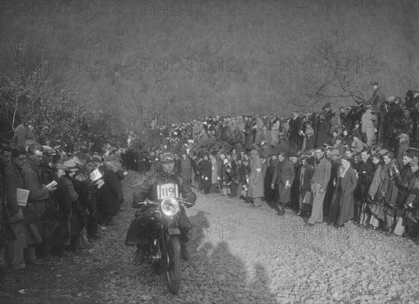 499 cc Ariel of LA Barrett competing in the MCC Lands End Trial, Beggars Roost, Devon, 1936. Artist: Bill Brunell.