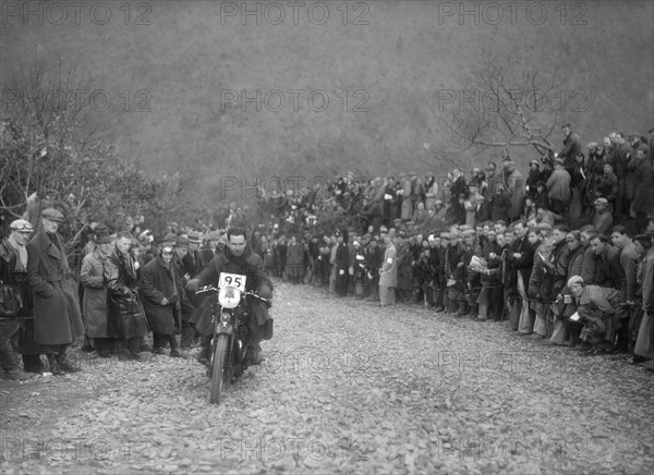 498 cc Ariel of JA Haywood competing in the MCC Lands End Trial, Beggars Roost, Devon, 1936. Artist: Bill Brunell.