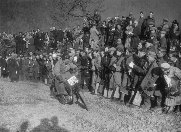 172 cc SOS of RWH Hole competing in the MCC Lands End Trial, Beggars Roost, Devon, 1936. Artist: Bill Brunell.