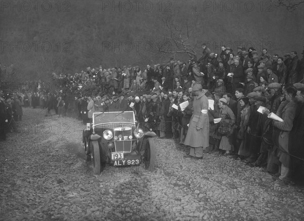 MG J2 of WH Edwards competing in the MCC Lands End Trial, Beggars Roost, Devon, 1936. Artist: Bill Brunell.