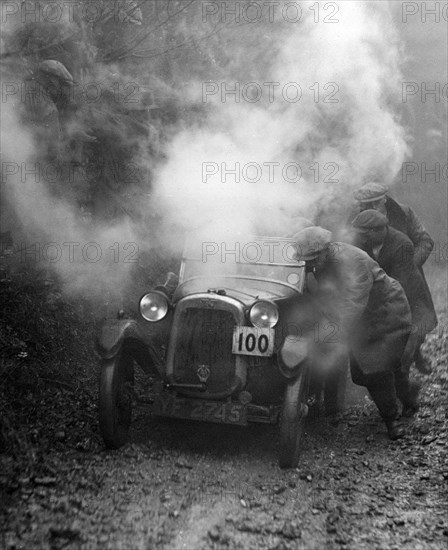 Austin GE Cup model of RH Massey at the MCC Exeter Trial, Meerhay, Dorset, 1930. Artist: Bill Brunell.