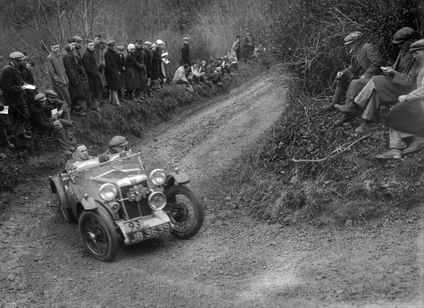 MG PA of RA MacDermid of the Cream Cracker Team competing in the MCC Lands End Trial, 1935. Artist: Bill Brunell.