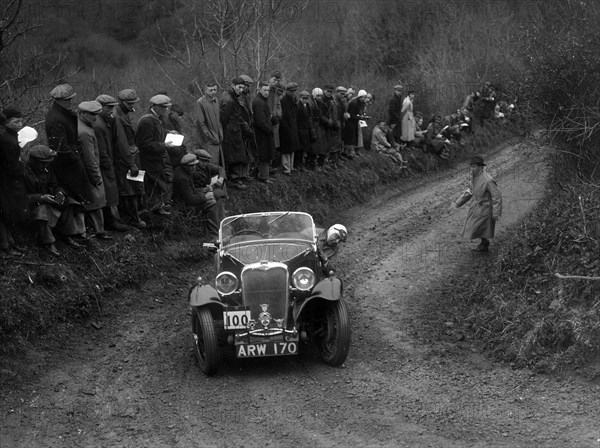 Singer Le Mans of J Eason-Gibson competing in the MCC Lands End Trial, 1935. Artist: Bill Brunell.