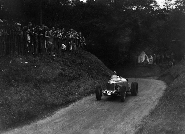 Riley competing in the Shelsley Walsh Hillclimb, Worcestershire, 1935. Artist: Bill Brunell.