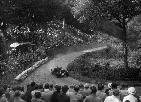 Railton light sports tourer competing in the Shelsley Walsh Hillclimb, Worcestershire, 1935. Artist: Bill Brunell.