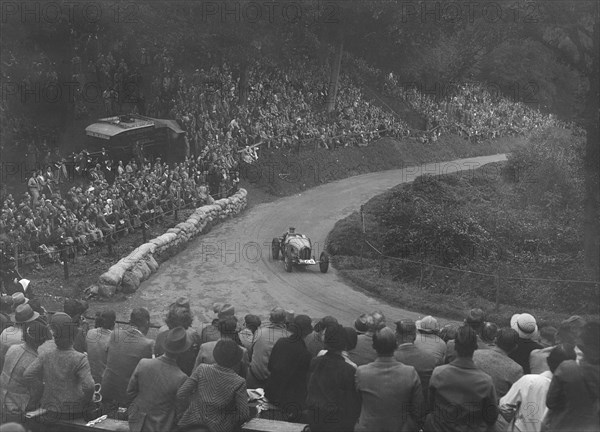 Bugatti Type 51 competing in the Shelsley Walsh Hillclimb, Worcestershire, 1935. Artist: Bill Brunell.