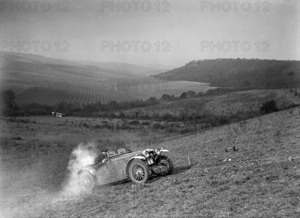 MG J2 competing in the London Motor Club Coventry Cup Trial, Knatts Hill, Kent, 1938. Artist: Bill Brunell.