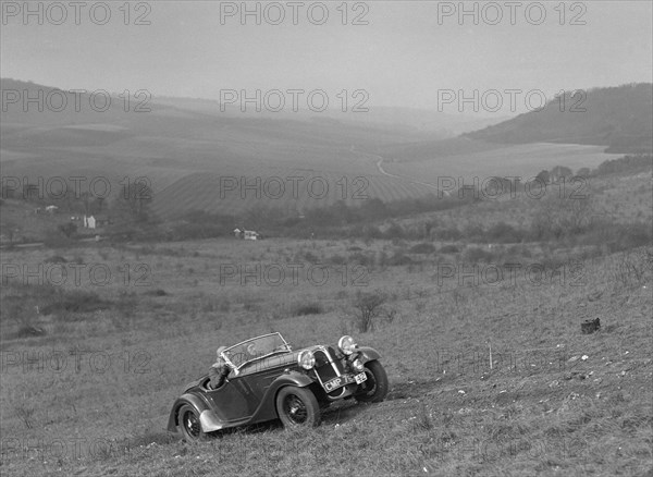 Frazer-Nash BMW 319 competing in the London Motor Club Coventry Cup Trial, Knatts Hill, Kent, 1938. Artist: Bill Brunell.