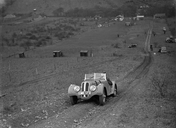 Frazer-Nash BMW 328 of H Wood at the London Motor Club Coventry Cup Trial, Knatts Hill, Kent, 1938. Artist: Bill Brunell.