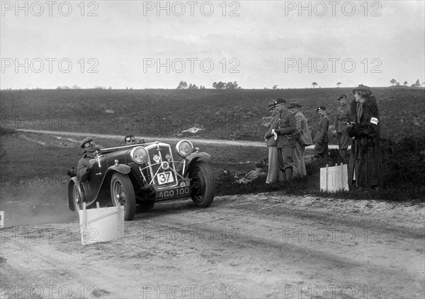 1933 Wolseley Hornet Special competing in a motoring trial, Bagshot Heath, Surrey, 1930s. Artist: Bill Brunell.