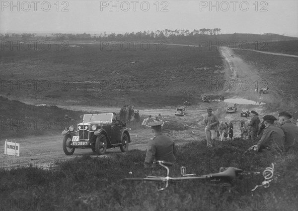 1931 Morris Minor open 2-seater competing in a motoring trial, Bagshot Heath, Surrey, 1930s. Artist: Bill Brunell.