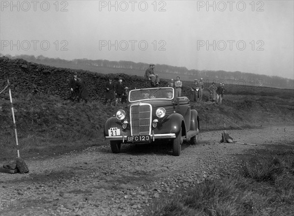 Ford V8 drophead of Viscount Chetwynd competing in the Sunbac Inter-Club Team Trial, 1935. Artist: Bill Brunell.