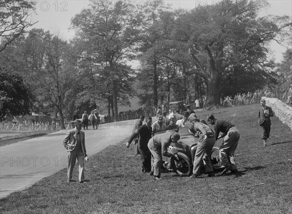 Crashed Austin 7 of B Sparrow, Donington Park Race Meeting, Leicestershire, 1933. Artist: Bill Brunell.