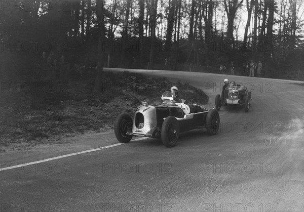 MG Magnette of AA Rigby leading JR Grice's Riley Brooklands at Donington Park, Leicestershire, 1935. Artist: Bill Brunell.