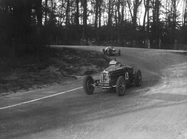 Bugatti Type 35B of Jock Leith leading a Riley Brooklands at Donington Park, Leicestershire, 1935. Artist: Bill Brunell.