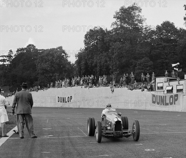 Bert Hadley's Austin7 works racer competing at Crystal Palace, London, 1939. Artist: Bill Brunell.