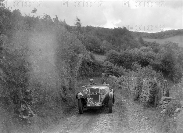 Singer open sports competing in the Mid Surrey AC Barnstaple Trial, 1934. Artist: Bill Brunell.