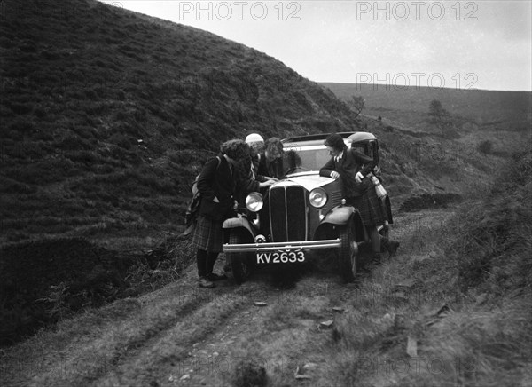 Kitty Brunell road testing a Standard Little Twelve saloon, c1932. Artist: Bill Brunell.