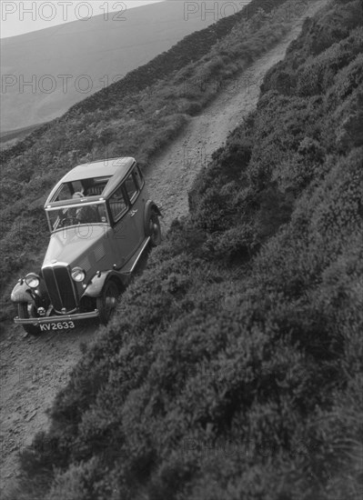 Kitty Brunell road testing a Standard Little Twelve saloon, c1932. Artist: Bill Brunell.