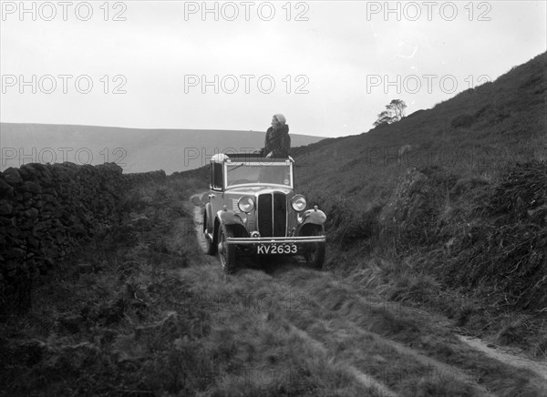 Kitty Brunell road testing a Standard Little Twelve saloon, c1932. Artist: Bill Brunell.