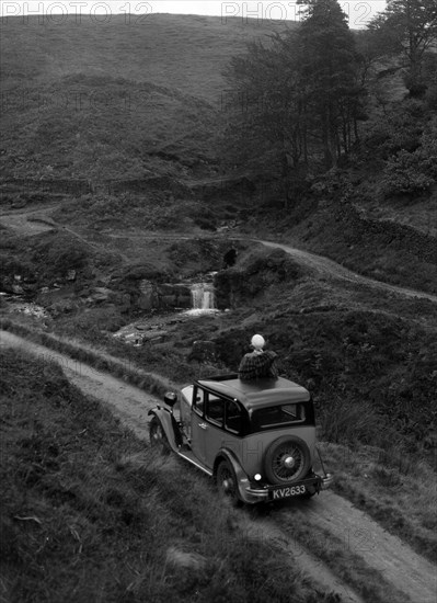 Kitty Brunell road testing a Standard Little Twelve saloon, c1932. Artist: Bill Brunell.