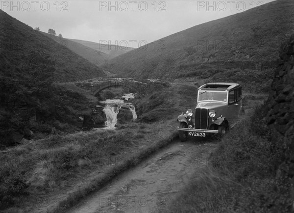 Kitty Brunell road testing a Standard Little Twelve saloon, c1932. Artist: Bill Brunell.