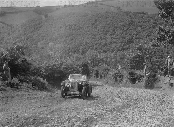 Austin 65 competing in the Mid Surrey AC Barnstaple Trial, Beggars Roost, Devon, 1934. Artist: Bill Brunell.