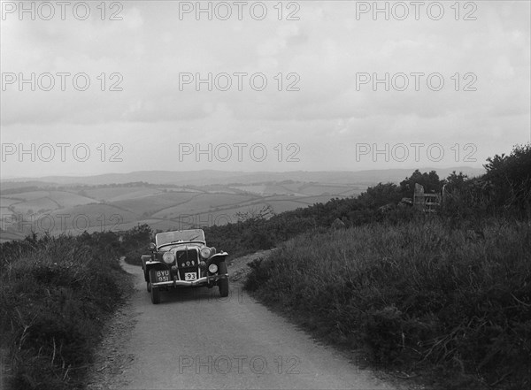 Jensen V8 of Alan Whiddington competing in the MCC Torquay Rally, 1938. Artist: Bill Brunell.