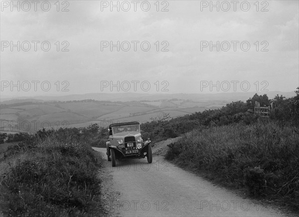 Ford V8 of WCN Norton competing in the MCC Torquay Rally, 1938. Artist: Bill Brunell.