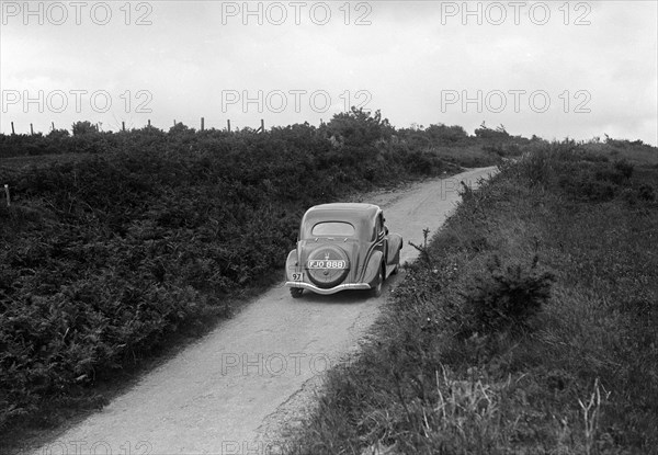 Ford V8 of Viscount Chetwynd competing in the MCC Torquay Rally, 1938. Artist: Bill Brunell.