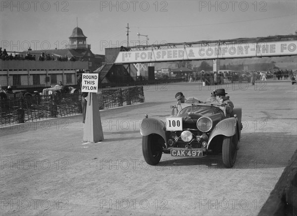 Jaguar SS 100 competing in the JCC Rally, Brooklands, Surrey, 1939. Artist: Bill Brunell.