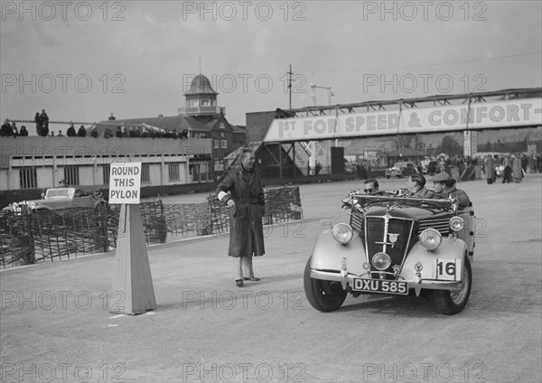 Renault open tourer competing in the JCC Rally, Brooklands, Surrey, 1939. Artist: Bill Brunell.