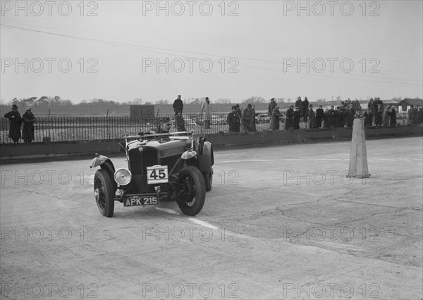 AC 16/66 competing in the JCC Rally, Brooklands, Surrey, 1939. Artist: Bill Brunell.