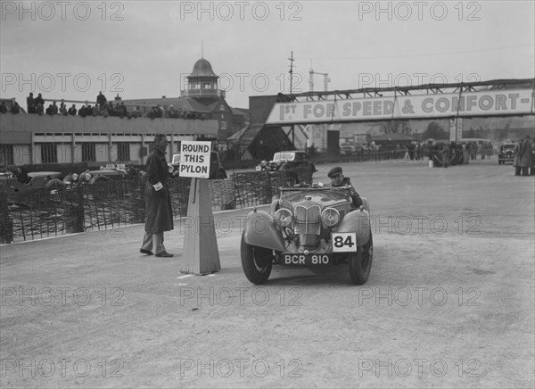 Riley Sprite of Kay Hague competing in the JCC Rally, Brooklands, Surrey, 1939. Artist: Bill Brunell.