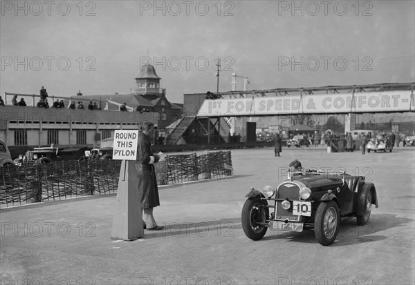 Morgan 4/4 competing in the JCC Rally, Brooklands, Surrey, 1939. Artist: Bill Brunell.