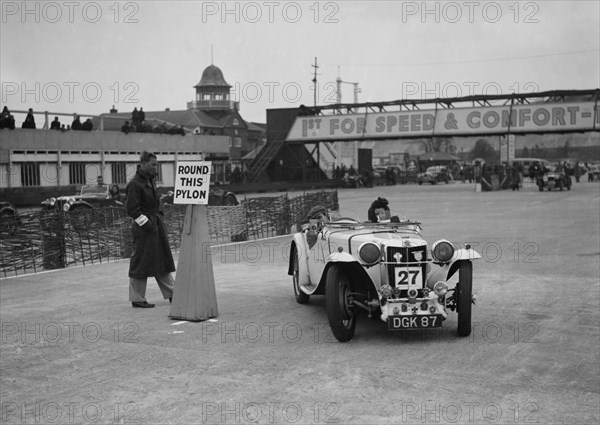 MG sports competing in the JCC Rally, Brooklands, Surrey, 1939. Artist: Bill Brunell.